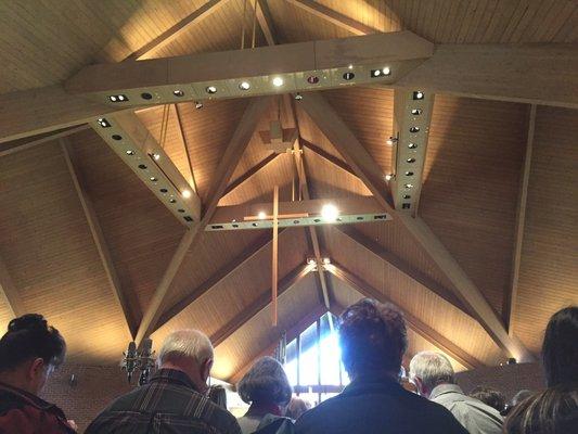 The sanctuary is sort of "+" shaped with the really high ceilings, lots of nature light & the alter in the middle.