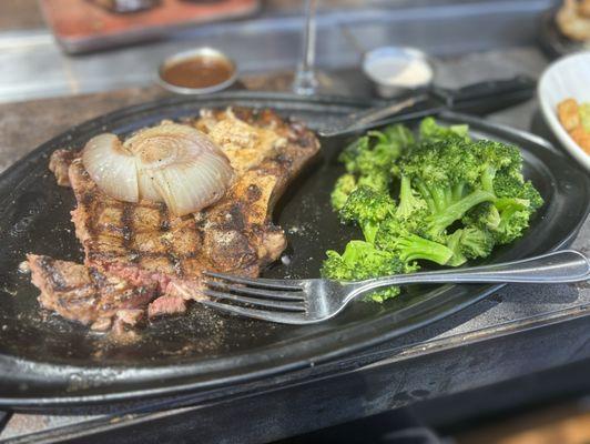 NEW Bone-In Ribeye* w/ Aussie Cab Onion & Seasoned Butter Fresh Steamed Seasonal Veggies