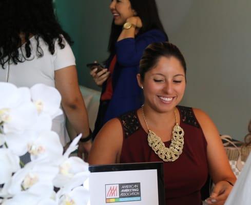 Laura of the AMA South Florida works the registration table.