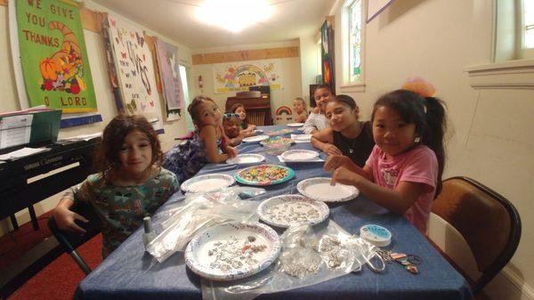 Having fun doing crafts at Singing SummerCamp