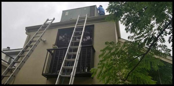 Once we have moved the unit onto roof line we mount and safely secure