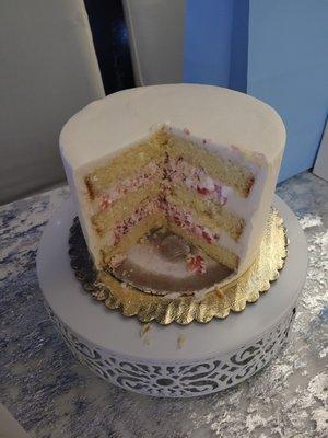 Dominican cake with strawberry filing. CAN YOU FIND THE STRAWBERRIES? NOT  IMPRESSED