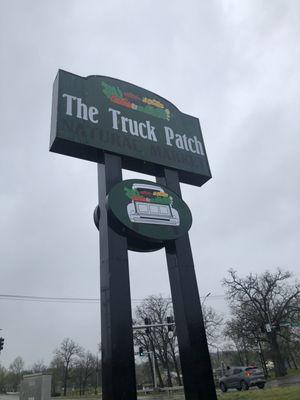 The sign says the truck patch natural market #LikeAWholeFoods