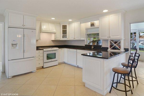 Custom Granite Kitchen in Waterfront, Ocean Access Home in Palm City, FL