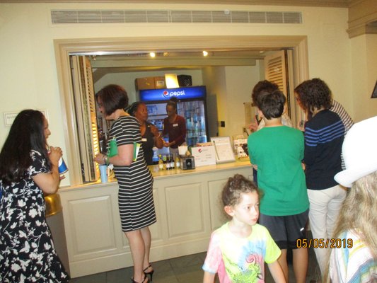 Opera in Williamsburg: In the Kimball Theatre Lobby, selling snacks on the left.