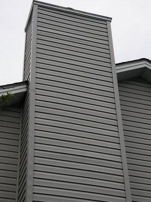 Chimney chase siding repair