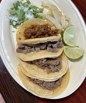 From the top: pastor, lengua, and barbacoa