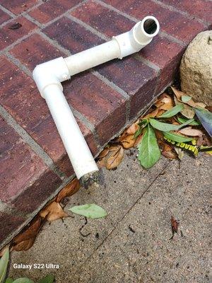 clogged pipe from under the vanity bathroom sink