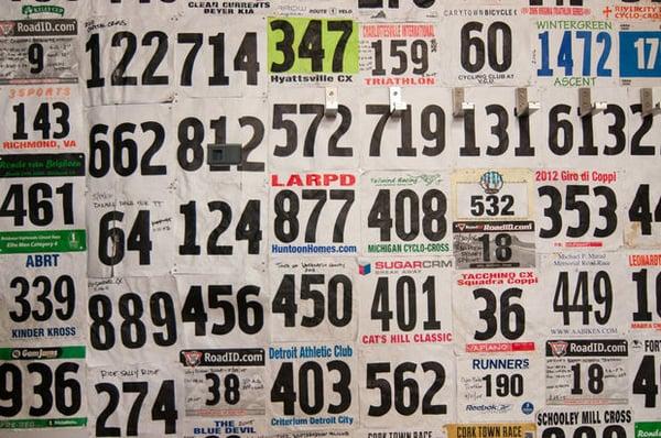 Race numbers on the wall.