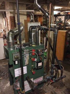 New steam boiler we installed. Note we actually use both 2" supply outlets of the boiler giving you more steam: faster, better, drier.