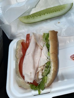 Turkey lettuce tomato and mayo this place never disappoints there for and homemade pickles are a pregnant girls dream