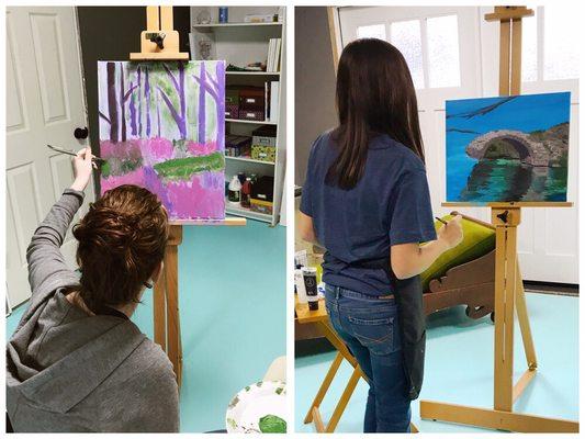 Two of the Teen Studio artists working on paintings of their own choice.