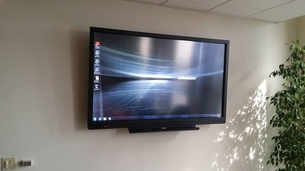 70" Sharp touch screen monitor installed with built in Windows operating system. Great addition for a conference room.