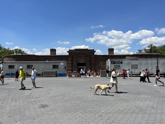 Main entrance with workman trailers.