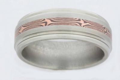 Mokume Gane is an ancient Japanese technique that layers and bonds different metals into a swirled pattern...