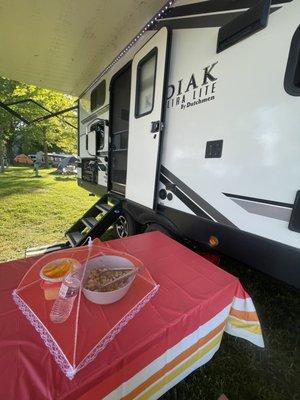 Picnic table and fire ring included, amazing water and dump station also, has two lanes.