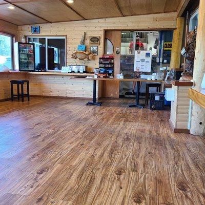 Dining area, ordering station for The Galley, a food truck attached to the seafood and ice cream store.