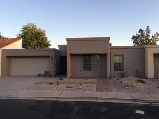 Lovely sitting patio with walkways, clean water efficient landscape.  Space for plants to grow and fill in...