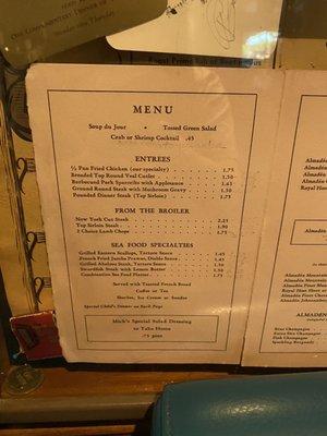 Historic menu by the entrance of the Brass Door. 1/2 a chicken for $1.75 back in the day!!! That's crazy.