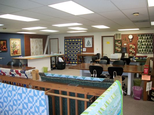 There is plenty of room in our classroom.  We have 8 ft. tables and can seat 12 students.