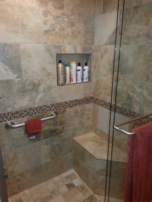 Our customers love incorporating benches, grab bars, and niches in their custom built showers.