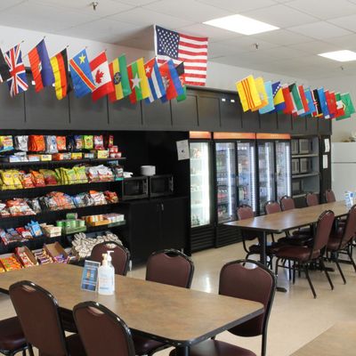 Flags in our cafeteria representing all the countries of the people we employ.