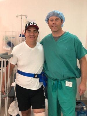 Dr. Hollis with ACL patient post-surgery.