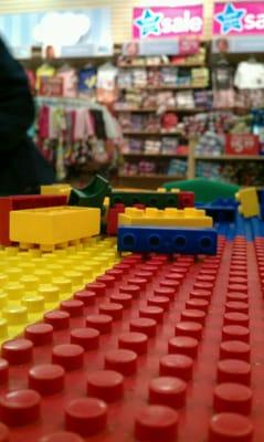 Lego table for all the kids and dads while mom shops