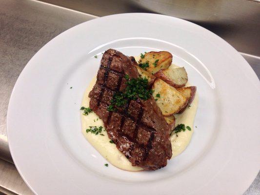 Pub Steak. Grilled Painted Hills Ranch Coulotte steak with garlicky cauliflower purée, roasted potatoes and gremolata