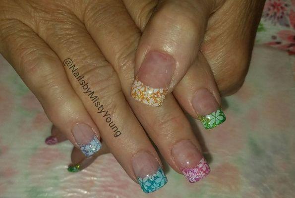 Multi colored French acrylics with flower stamp design