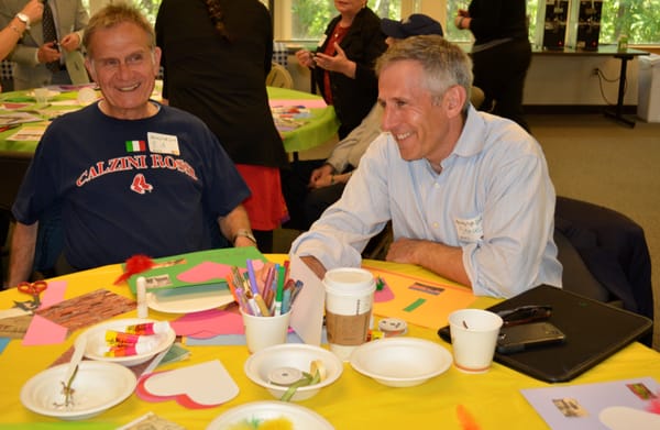 FirstLight HomeCare Owner Steve Stern (right) with Client, Ed (left) enjoy a laugh at the JF&CS Memory Cafe in Waltham, MA.