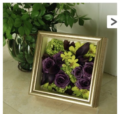 Love this shadow box full of all types of gently preserved flowers