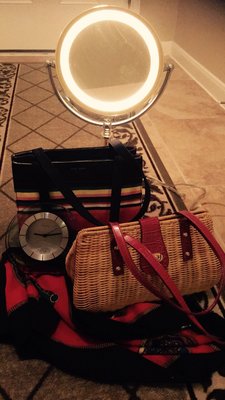 Make up mirror with light, kate spade tote bag, worthington rattan bag, bulova desk clock, and scarf from the Goodwill Outlet North.