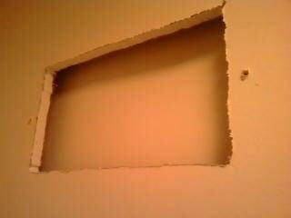 hole in bathroom wall