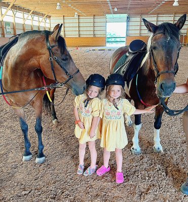 Tink and Kit posing with two of our Ridgebury Riders