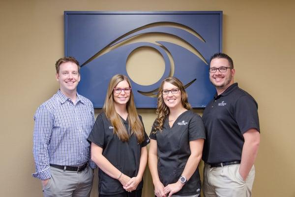 From left to right: Dr. Jason Harper, Chaissidy (technician), Kris (receptionist), Shaun (optician)