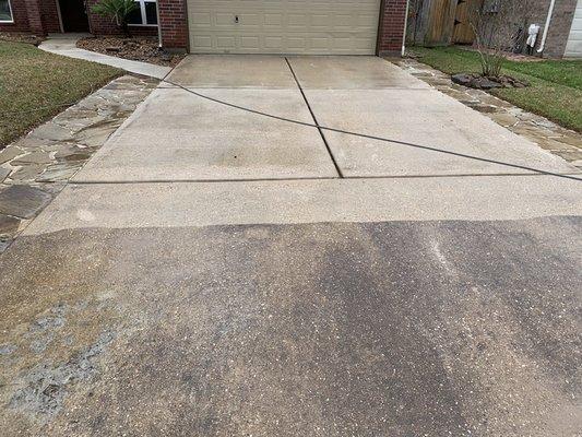 The difference in this customer's driveway is astounding after being pressure washed!