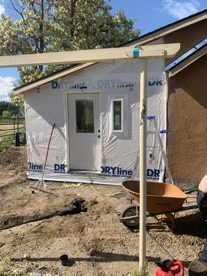 House rap installed ready for siding. Prep for deck.