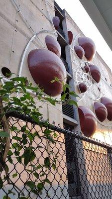 Decorative wall on the adjacent parking structure.