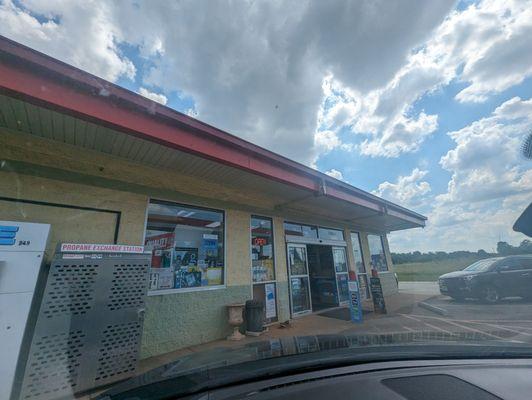 Main entrance. It also has a liquor store/wine store to the left.