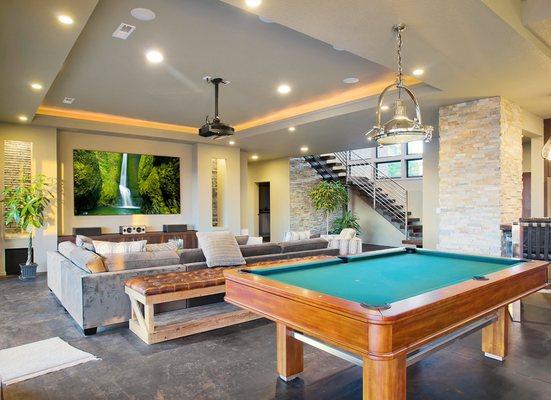 Entertainment room, man cave, pool table, projector, TV. Call us today at 9566001210 for a free consultation