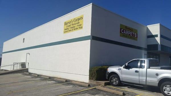 When looking for Harveys Carpets look for the white building with the green stripe.