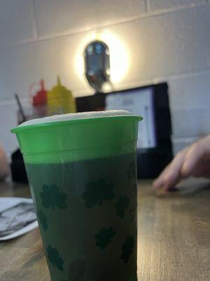 Good beer in a green cup for St Patrick's Day