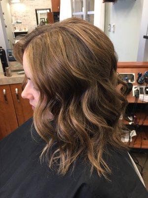 Loose waves and caramel highlights