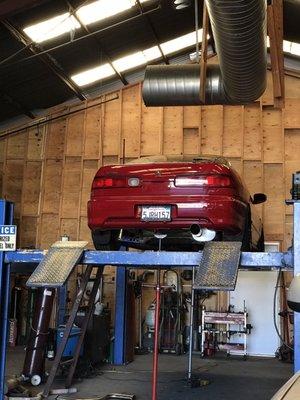 Acura Integra 2000 with a new exhaust and universal catalytic converter.