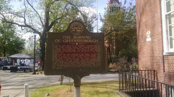 The historical marker referencing the burning of Greenborough.