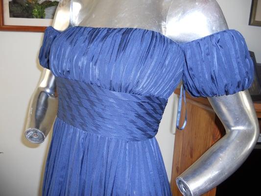 Max azria sleeves added from excess material from the gown.