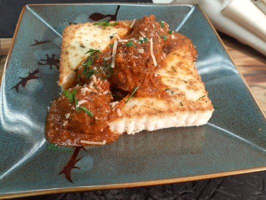 Beef and pork meatballs GF With tomato sugo. Served with seared polenta and grana padano