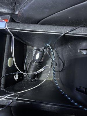 They didn't even touch the center console and he said it was because there are wires in there. There's one plug that's easy to move