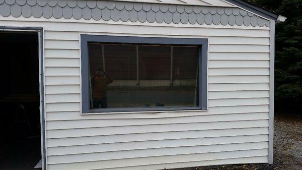 Before picture of window replacement. The pane of glass was falling do to rot of the sill.